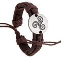 Brown braided PU leather bracelet with silver Triskele pendant on a white background - Spiral Rune