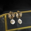 Elegant gold textured round earrings with hanging baroque pearls on a vintage stand - Stud White Small-12mm