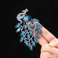 Peacock brooch with blue crystals on gold base, size 11.5cm x 7cm, weight 56g - DW0036 Peacock / 11.5cm*7cm / Blue