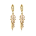 Macro shot of 18K gold plated wheat leaf earrings with sparkling marquise zirconia crystals - White