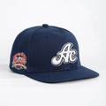 Navy blue baseball cap with 3D AC embroidery and sports badge from a 45-degree angle - Navy Blue / Adjustable