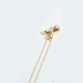 Minimalist golden necklace with an abstract Y-shaped pendant on a clean white background - Letter Y