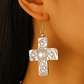 Silver cross earrings with screw texture and faux pearls on model for stylish look - Silver Earrings (Pearl Cross G-417)
