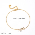 Bracciale in acciaio inossidabile placcato oro 18k con zirconi e misure dettagliate - Cavigliera con Pietre Geometriche (TA8040)