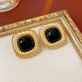 Detail showing vintage square gold earrings with rope texture and black gemstone inlay - Silver Earring Post-Black / Black
