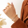 Goudkleurige sieradenset met U-link zirkonarmband en opengewerkte statement ringen - Goudkleurige U-Link Hoefijzer Armband (E044-Goudkleur)