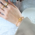 Bracciale in acciaio al titanio dorato con fibbia OT a fiore di prugna e anello prezioso - 16cm / Bracciale Oro