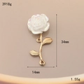 Macro detail of a 34mm white resin rose charm with golden alloy stem for DIY jewelry - Iridescent White Rose (3918g)