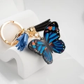 Blauer Schmetterling Schlüsselanhänger mit schwarzer Quaste und Goldring - Blauer Schmetterling (4-22-21)