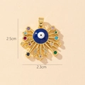 Golden Evil Eye pendant with blue core, stars and moon charms, 2.5cm x 2.3cm accessory - Gold Stars and Moon Surrounding Evil Eye Pendant (48)