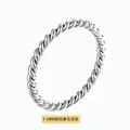 Macro detail of a 1.5mm steel twisted ring with minimalist rope texture finish - US 6 / Silver