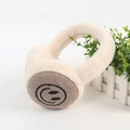 Detail of soft beige plush earmuffs with a smiling face pattern on herringbone fabric - White