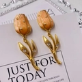 Detail of tulip earrings with peach enamel petals, pearl beads and crystal leaves - 925 Silver Earring Post / Gold Tulip