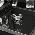 Detailed view of silver bow ring featuring moonstone heart and pink gemstones decoration - Heart Moonstone Style Open Ring (No. 3)