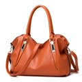 Chic orange faux leather tote bag for women with dual handles and adjustable shoulder strap - Brown