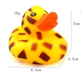 Detailed view of yellow rubber duck toy with brown spots showing size and weight specs - Yellow Leopard Print Duck