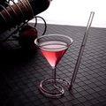 Creative glass cocktail cup with integrated spiral straw base filled with pink liquid - 100ml Spiral Vampire Glass