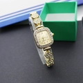 Detail view of gold square watch with crystal embellishments and flower link bracelet - Square Gold Gold