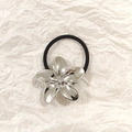 Minimalist silver flower hair tie with glossy metallic finish and black elastic band - Silver Flower