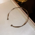 Elegante bracciale rigido argento ritorto con sfere metalliche in una scatola regalo - Canna di Fucile
