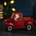 Vintage red Christmas truck snow globe featuring a Santa Claus figure in water ball - Truck Santa Claus