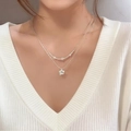 Double-layered silver necklace with delicate metallic beads and a sparkling star pendant - Hexagonal Star Rhinestone Double Layer Necklace (WG-0700) / Bright Silver
