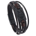 Detail of woven leather bracelet with engraved wolf head on black metal magnetic clasp - Wolf Head Brown