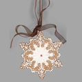 Golden snowflake Christmas ornament with white details and red center on brown ribbon - Snowflake