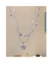 Dettaglio di una collana a doppio strato con ciondolo a stella in zircone e perle - Collana Pendente Stella Doppio Strato / Argento