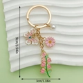 Detailed view showing the 9cm dimensions of the crown fan butterfly alloy keychain charms - Pink Butterfly Pearl Lily (ER1542)