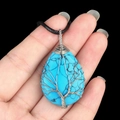 Silver tree of life wire wrapped turquoise teardrop pendant necklace with black cord - Blue Turquoise (Synthetic)