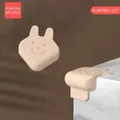 Paraspigoli per bambini in silicone a forma di coniglio color albicocca con adesivo - Coniglio Angolo Albicocca