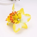 Detailed close-up of a realistic yellow and white silk orchid flower hair clip - Yellow