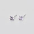 Macro shot of S925 silver four-petal flower earrings with purple zircons - Silver Purple Zirconia