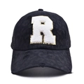Close-up of leopard print baseball cap with chenille R patch and mesh back detail - Letter R Style (R-漏洞马尾棒球帽)