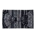 Detail view of ethnic geometric pattern wide headband with center bow decoration - Striped Black Grey