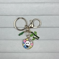 Cute panda keychain with bamboo charms and gold metal ring in colorful enamel finish - Panda Sitting on Chair