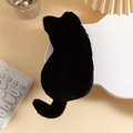 Detailed back view of a cute plush black cat pencil case with a small tail on a desk - Black