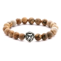 Beaded bracelet with natural earth-tone stones and a silver lion head charm - Picture Stone + Silver