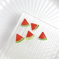 Five resin watermelon slice charms with red pulp and green rind for DIY crafts - Watermelon