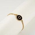 18K gold plated stainless steel bracelet featuring a round black charm with letter O - Letter O / Gold/Black