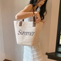 Beige woven straw tote bag with black Summer embroidery and brown leather handles - Beige