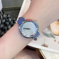 Women's watch with crystal-encrusted dial and blue crocodile leather strap on wrist - Silver Case Blue Leather