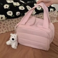 Pink quilted travel makeup bag with cute plush dog pendant and large storage capacity - Creamy Pink