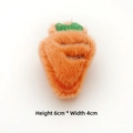 Detail of plush carrot accessory with soft texture and green leaves measuring 6cm by 4cm - Orange Carrot