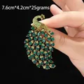 Elegant gold peacock brooch with green rhinestones and crystals, size 7.6cm by 4.2cm - YNCP6593 Peacock / 7.6cm*4.2cm / Green