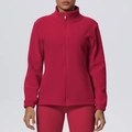 Detail of magenta fleece sports jacket showing high collar and smooth zipper closure - S / Carmine