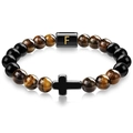 Detail of tiger eye and black onyx beaded bracelet with cross and golden letter F - Letter F