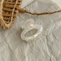 Detail of handmade pearlescent acetate hair claw clip with France engraved text - AB White