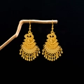 Ethnic golden cloisonne peacock earrings with hollow metal design on a dark wood branch - Retro Gold Peacock Drop Earrings